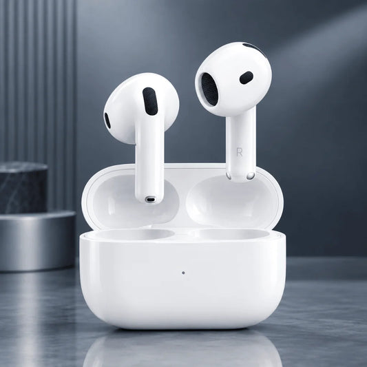 White wireless earbuds in an open charging case on a dark gray reflective surface, with a blurred modern background.