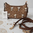 Coach Teri Shoulder Bag CBJ88 with Snoopy Print in Signature Coated Canvas