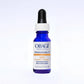 A bottle of Obagi Medical Professional-C 10% Vitamin C Antioxidant Serum, featuring a cobalt blue glass bottle, white cap, and black dropper on a light gray gradient background.