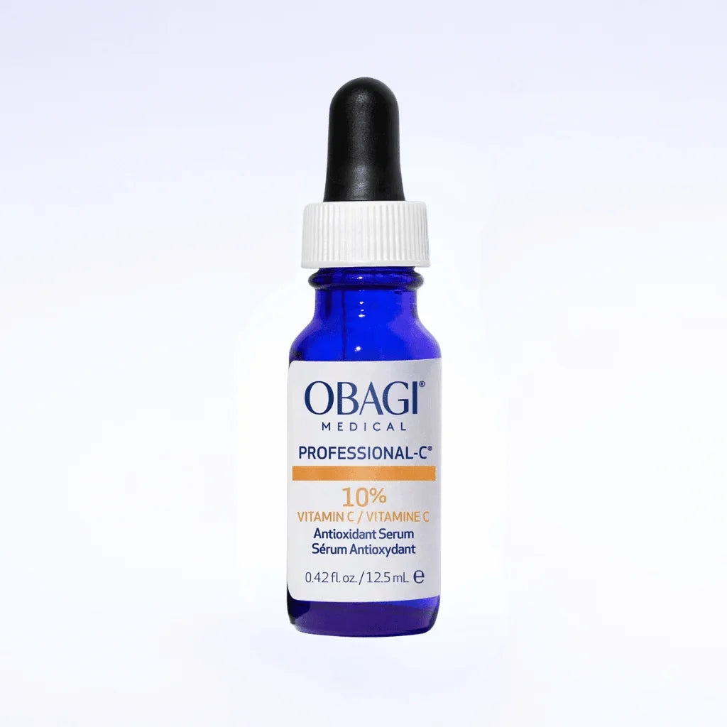 A bottle of Obagi Medical Professional-C 10% Vitamin C Antioxidant Serum, featuring a cobalt blue glass bottle, white cap, and black dropper on a light gray gradient background.