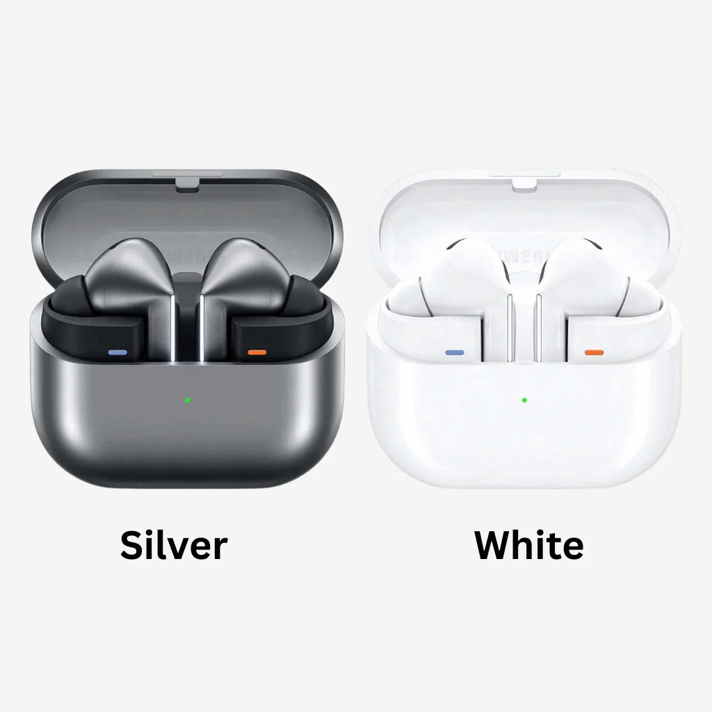 Two pairs of wireless earbuds in open charging cases shown side by side on a light gray background, labeled Silver and White. The left case is metallic silver with black earbud interiors and small blue and orange indicator lights; the right case is white with matching earbuds and lights.