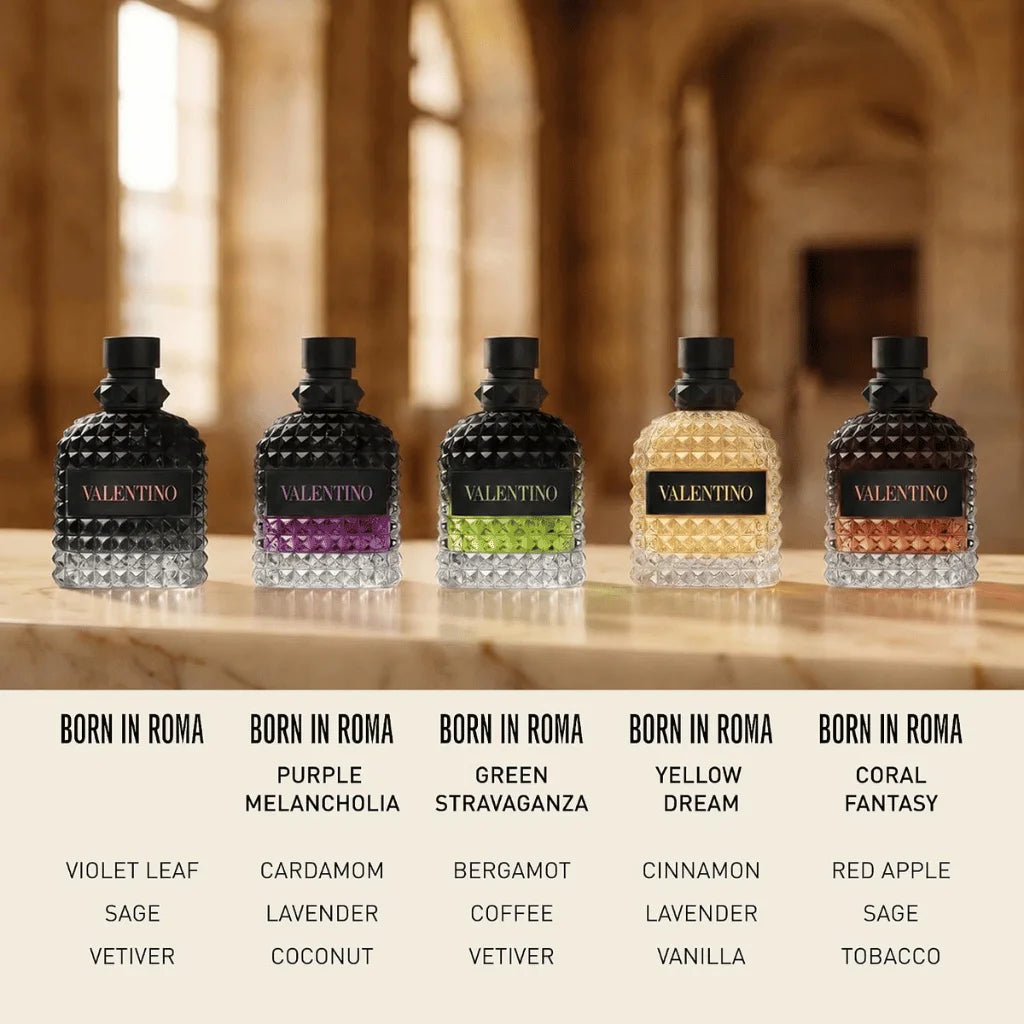 Five Valentino perfume bottles labeled Born in Roma are lined up on a wooden surface against a blurred warm interior background. The bottles have textured black, purple, green, yellow, and coral glass with black caps, and text below lists the scent notes for each fragrance.
