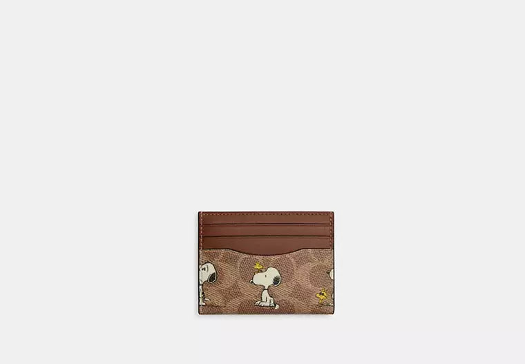 Coach x Peanuts Mini Skinny ID Case, Snoopy Print Signature Canvas, Tan