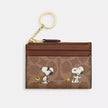 Coach x Peanuts Mini Skinny ID Case, Snoopy Print Signature Canvas, Tan